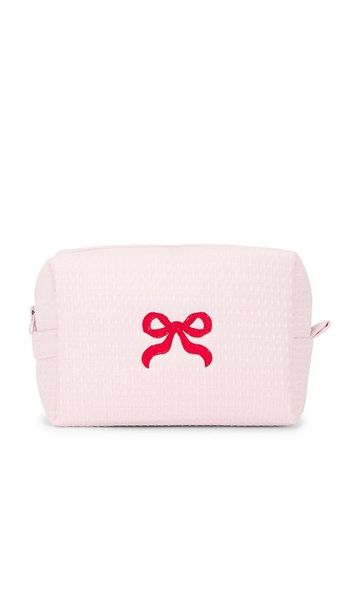abbode bow waffle pouch in peony.