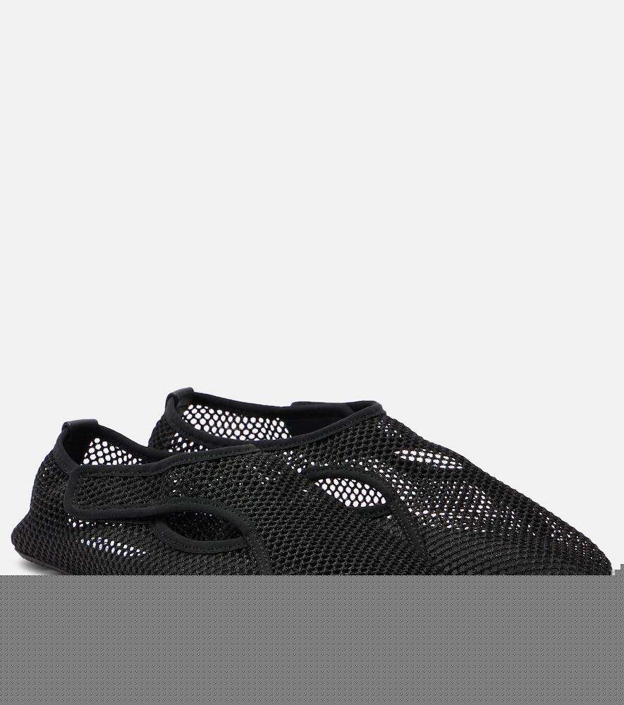 alaïa fishnet slip-on shoes