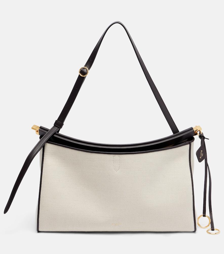 alaïa le click pocket large canvas shoulder bag