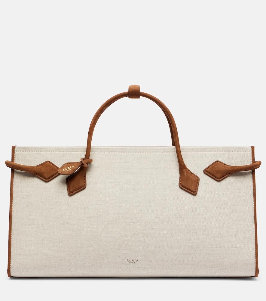 alaïa le teckel leather-trimmed canvas tote bag