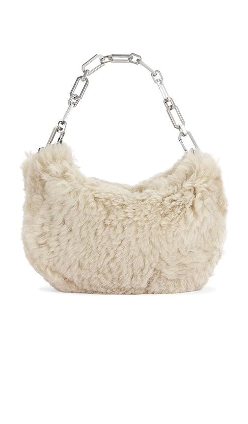 allsaints madea mini shearling bag in cream.