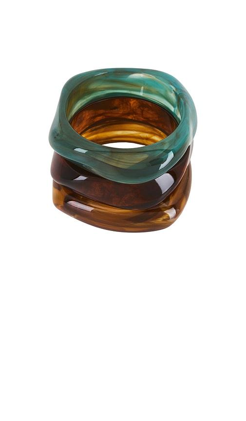 amber sceats natadola bracelet set in teal, brown, mustard.