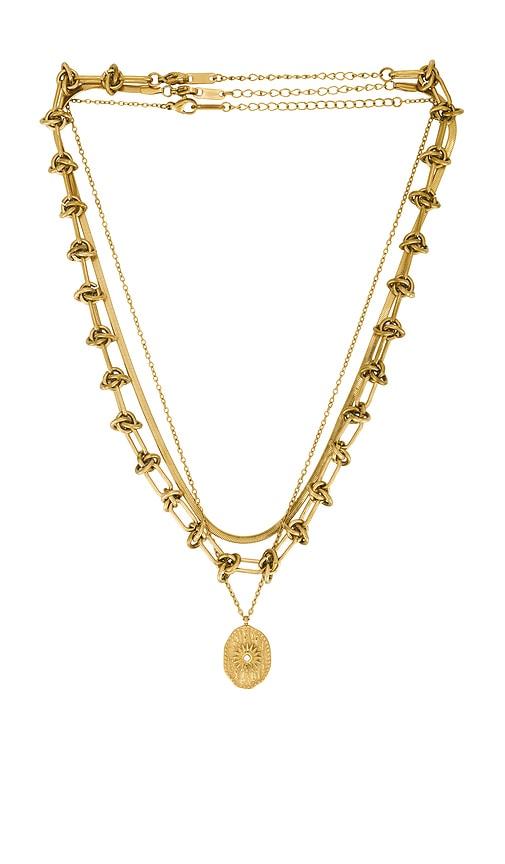 amber sceats raya necklace in metallic gold.
