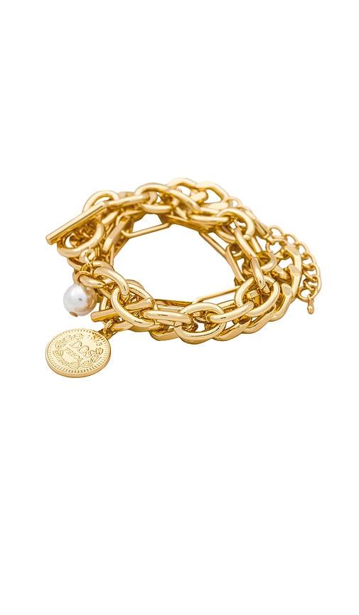 amber sceats x revolve lola bracelet set in metallic gold.