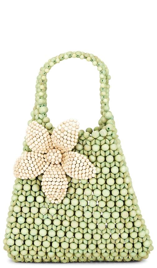 aranaz trapezoid flora bag in green.