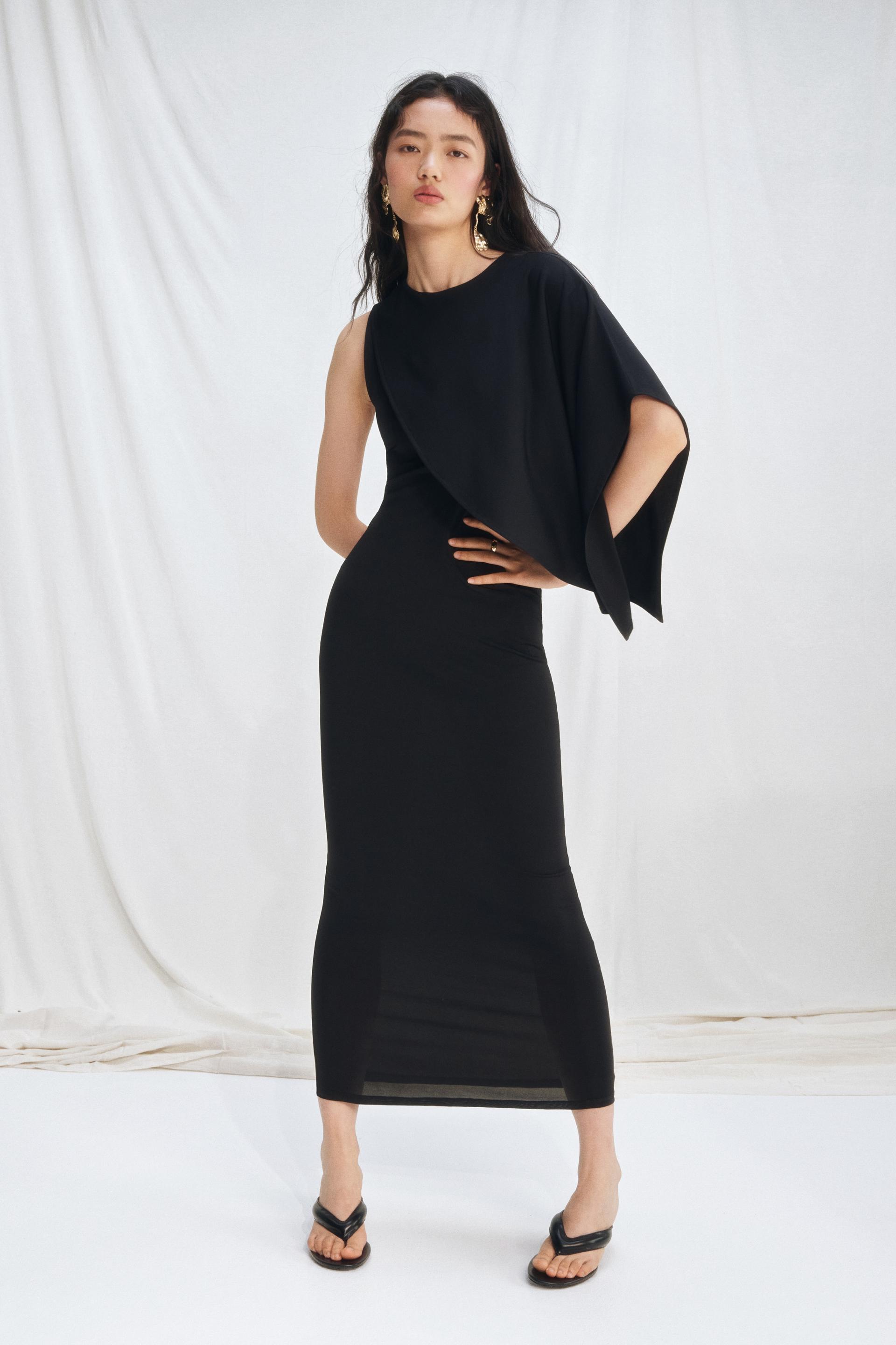 asymmetric cape-detail dress