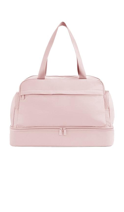away featherlight weekend bag in pink.