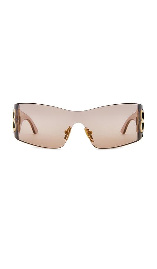 balenciaga bossy sunglasses in brown.