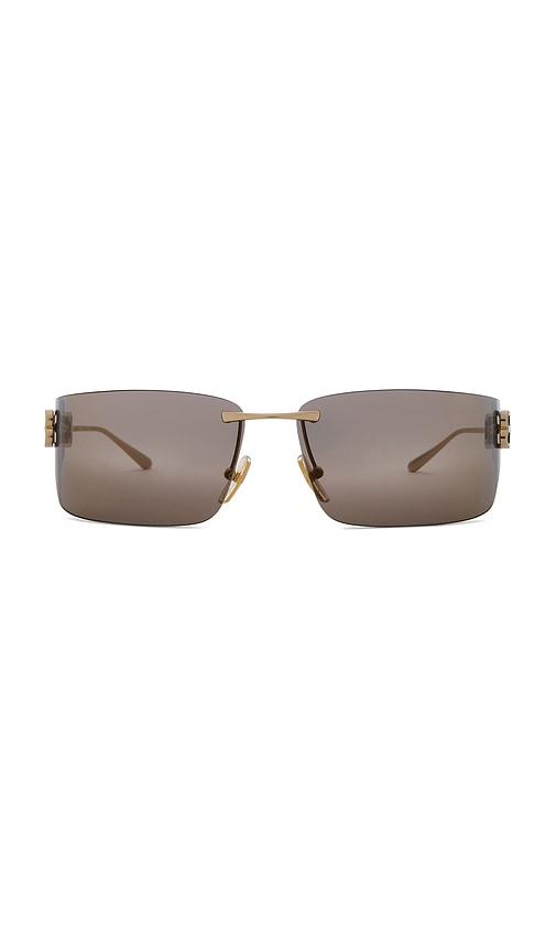 balenciaga gossip sunglasses in metallic gold.