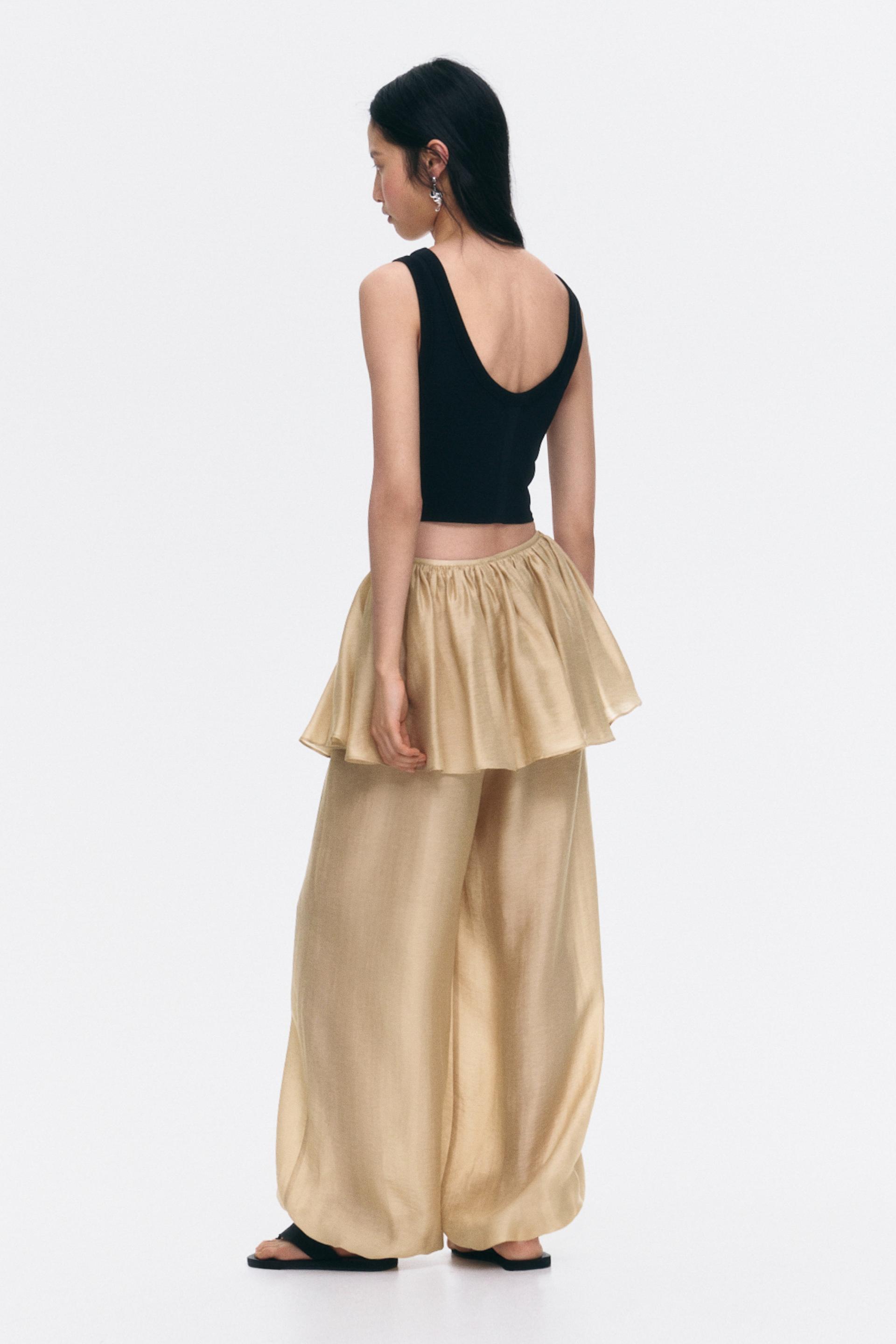 balloon-leg pants with layered skirt