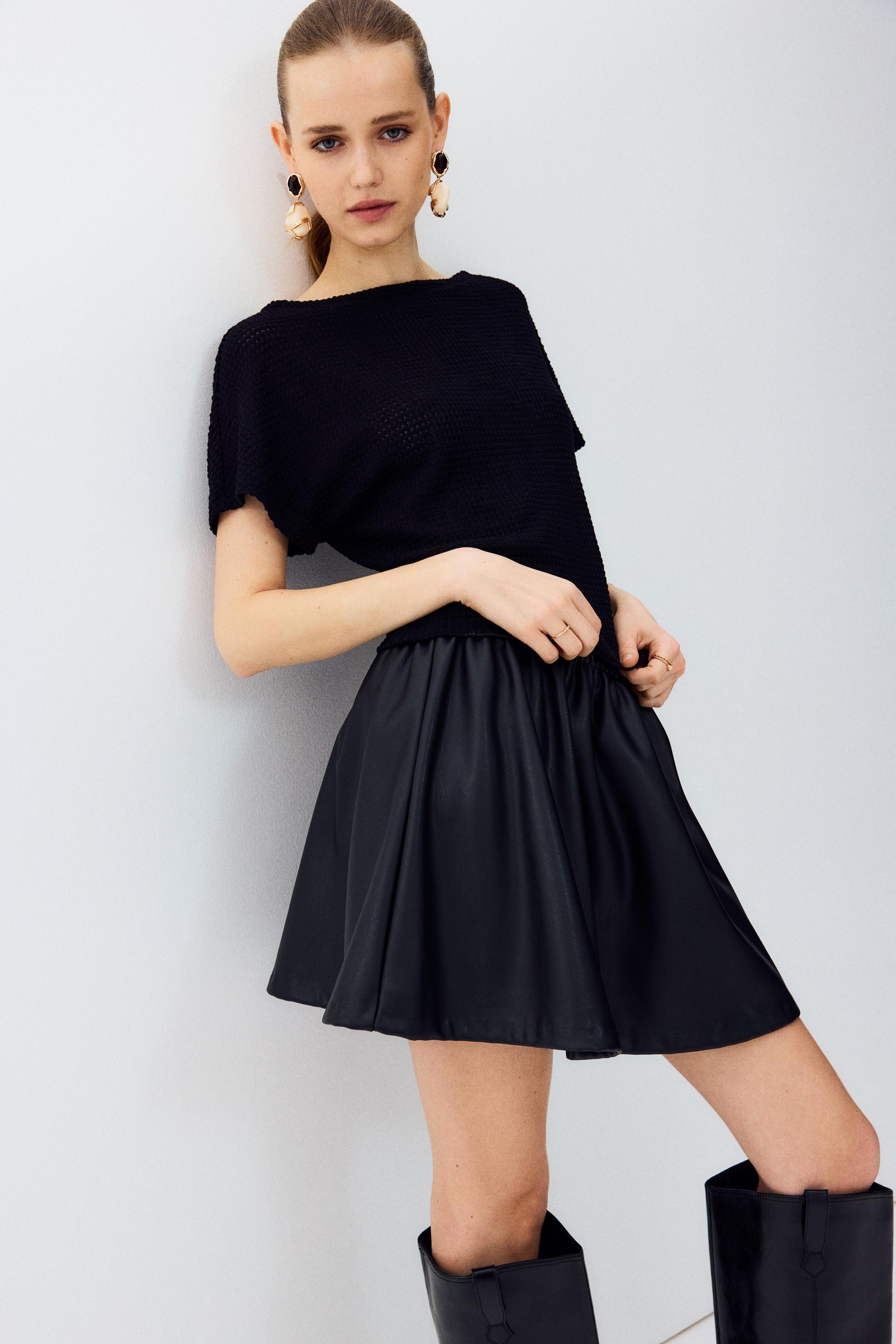 batwing-sleeved jersey top
