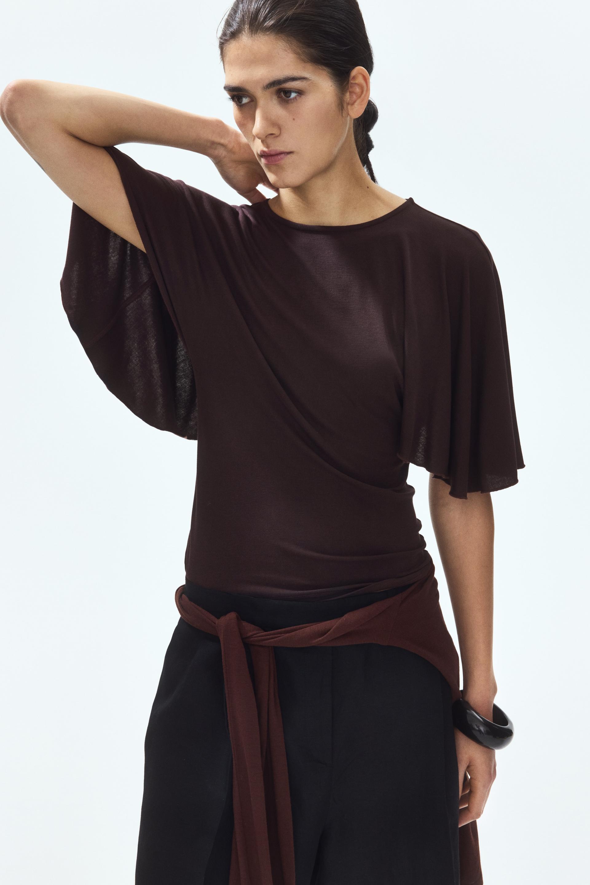 batwing-sleeved ribbed top