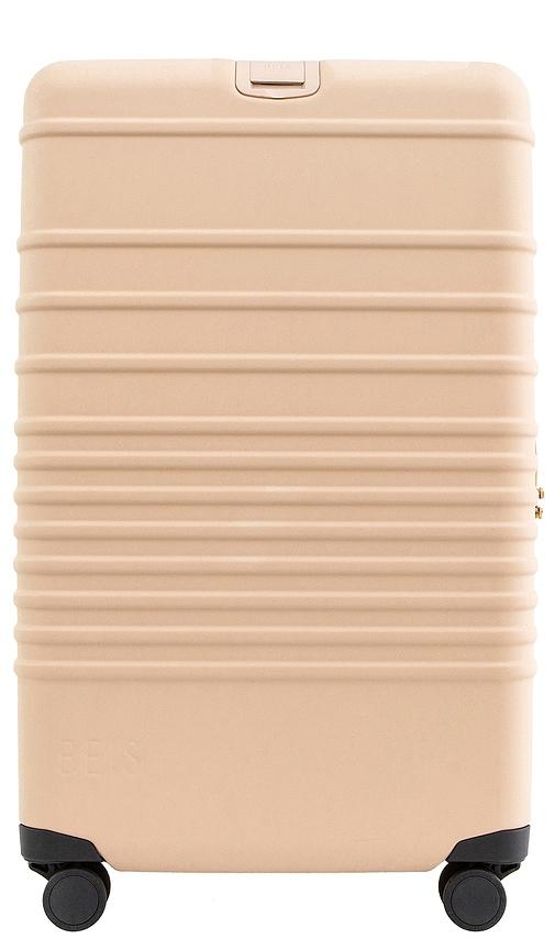 beis the large check-in roller in beige.