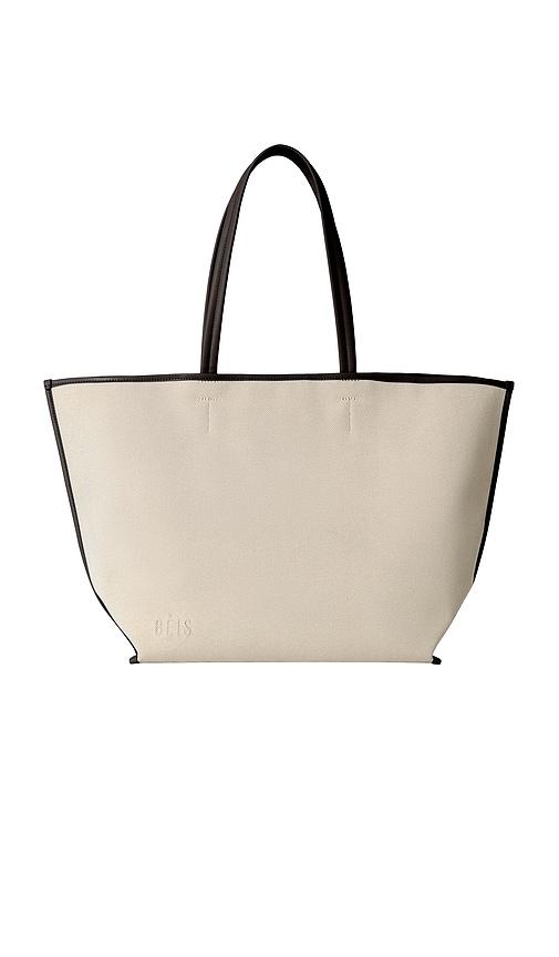 beis the leather trim tote in cream.