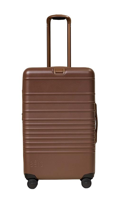 beis the medium check-in roller in brown.