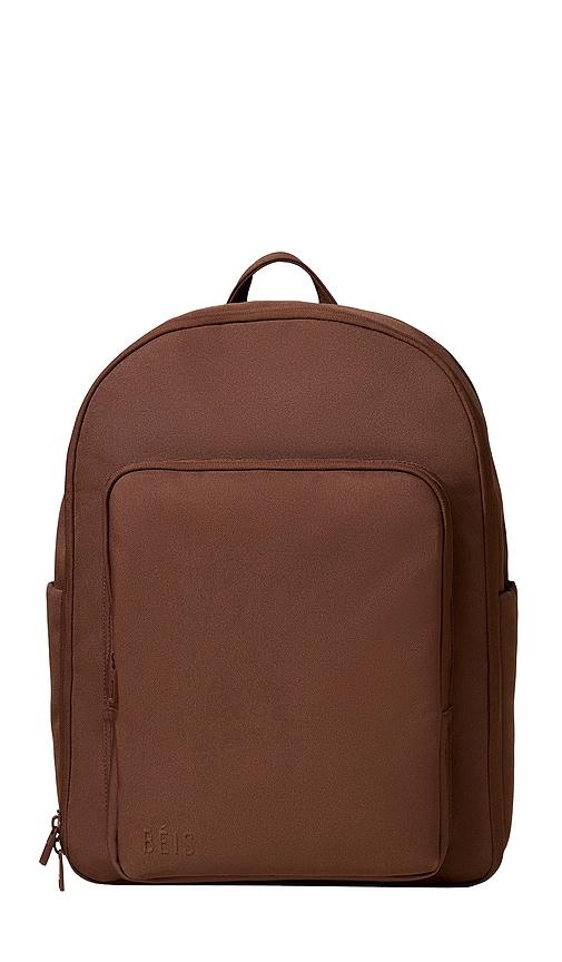 beis the travel backpack in brown.