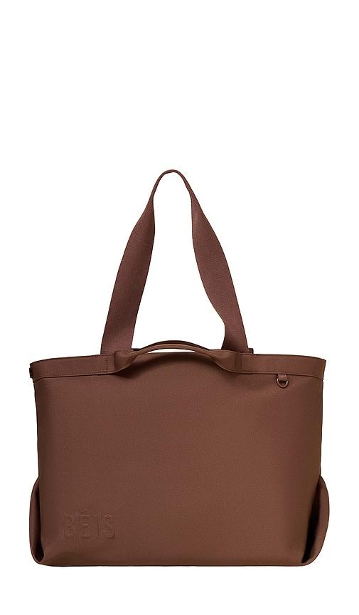 beis the travel tote in brown.