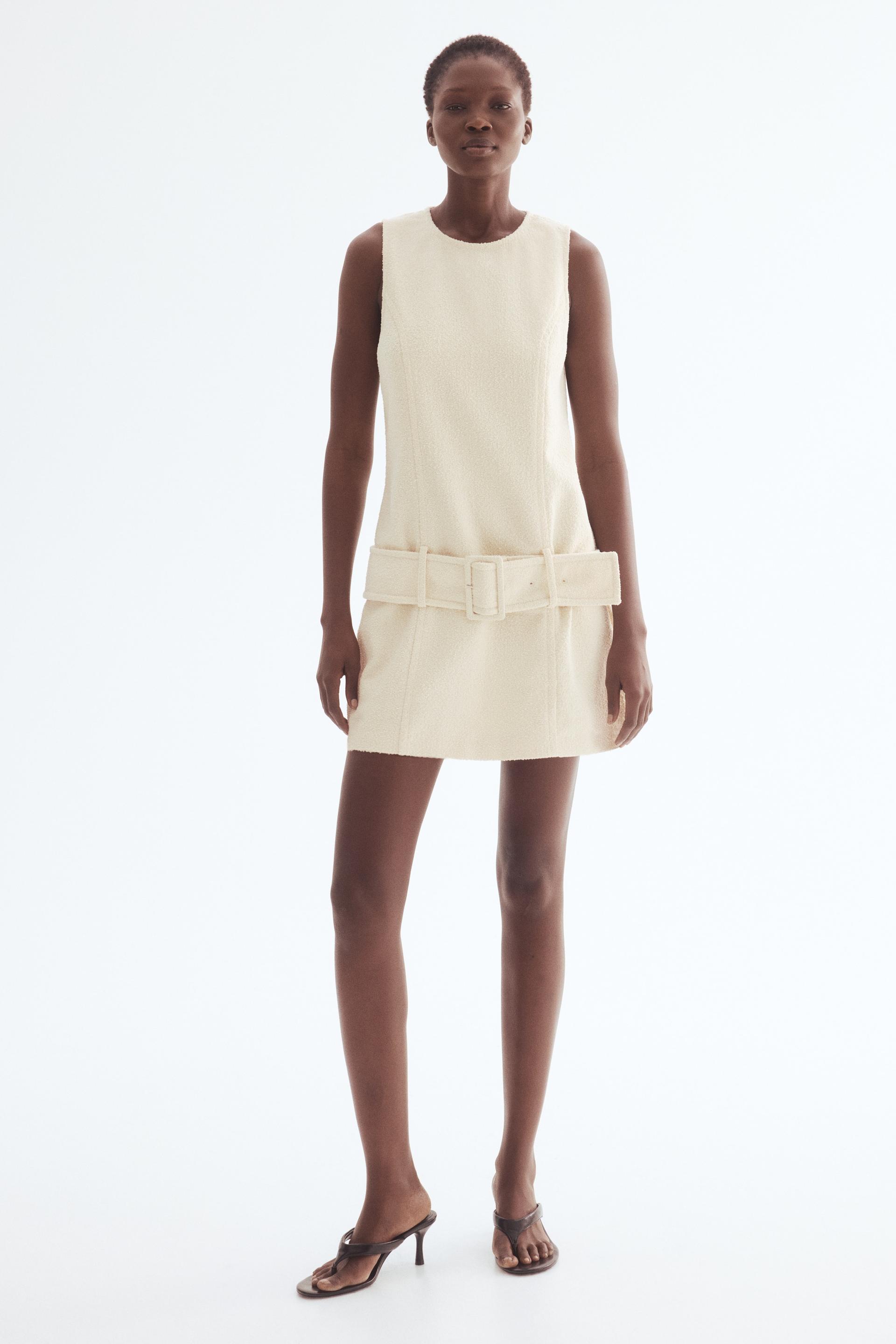 belted bouclé dress