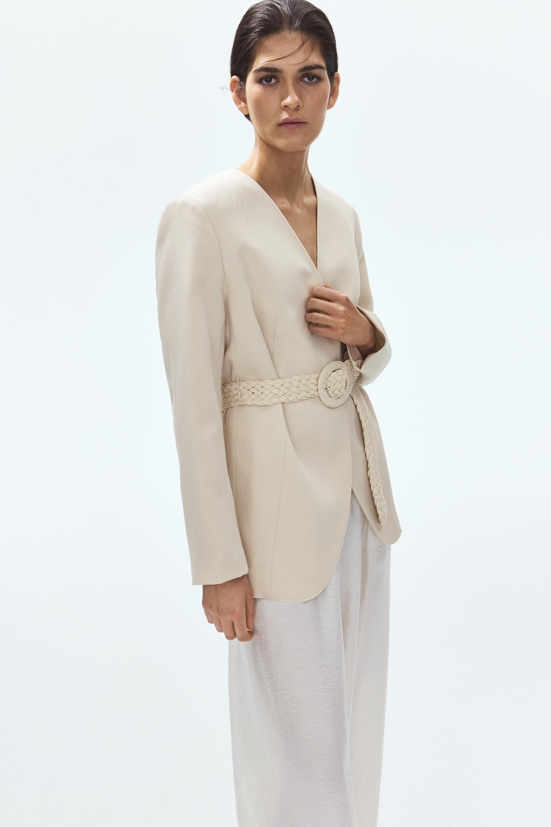 belted lapelless jacket