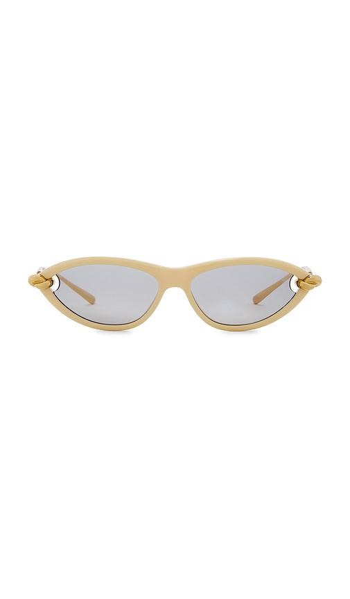 bottega veneta cat eye sunglasses in beige, gold, & grey.