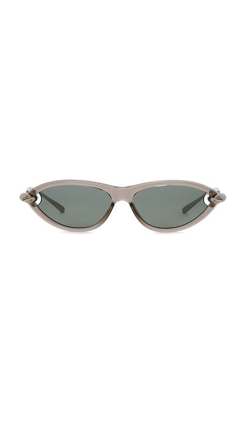 bottega veneta cat eye sunglasses in beige, silver, & green.