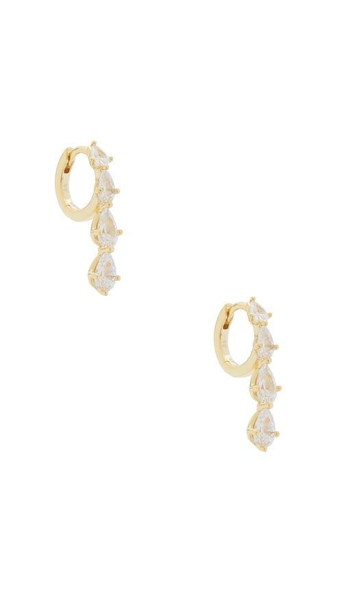 by adina eden teardrop cz cascade huggie earrings in metallic gold.