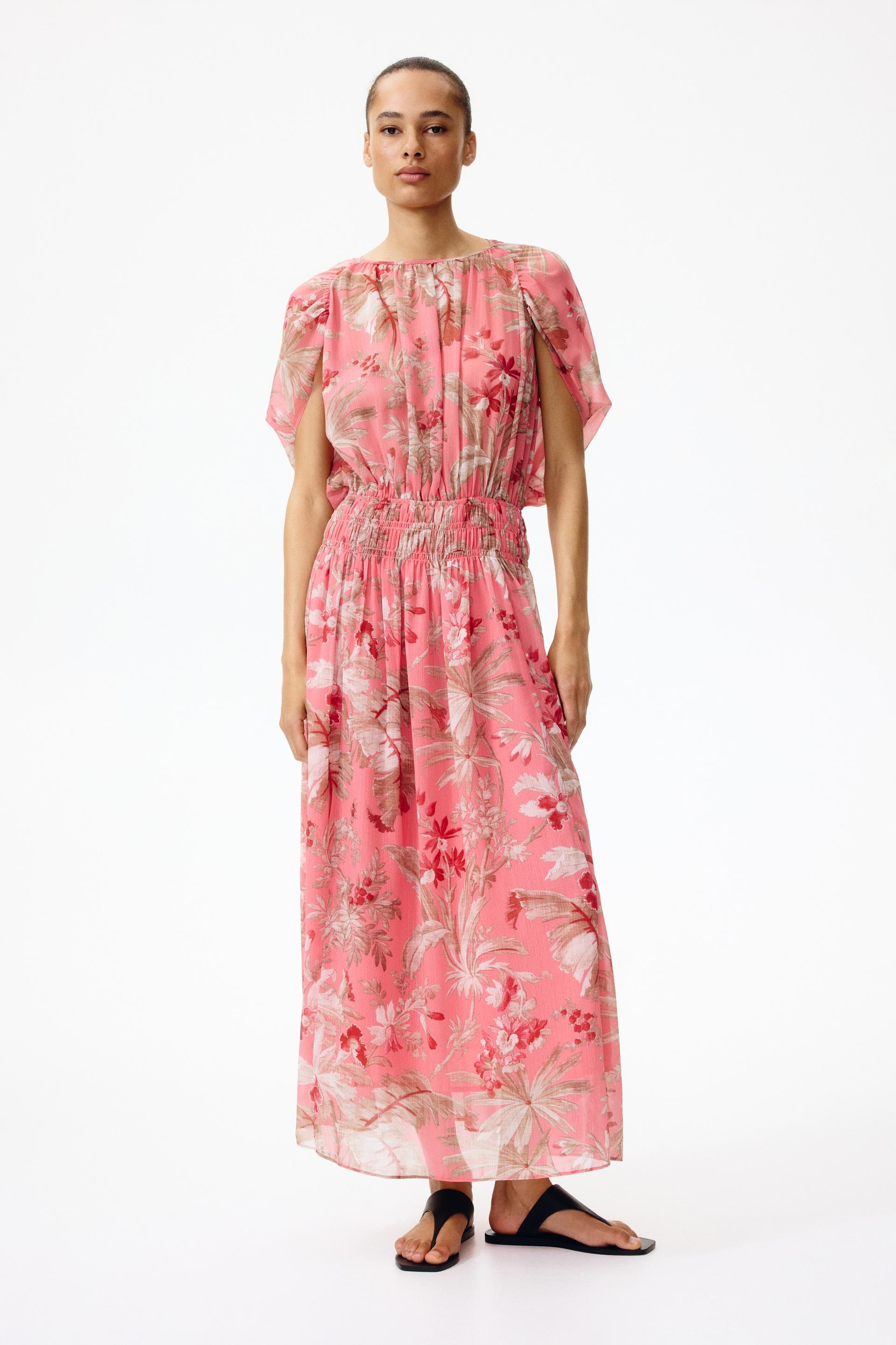 cape-sleeved chiffon dress