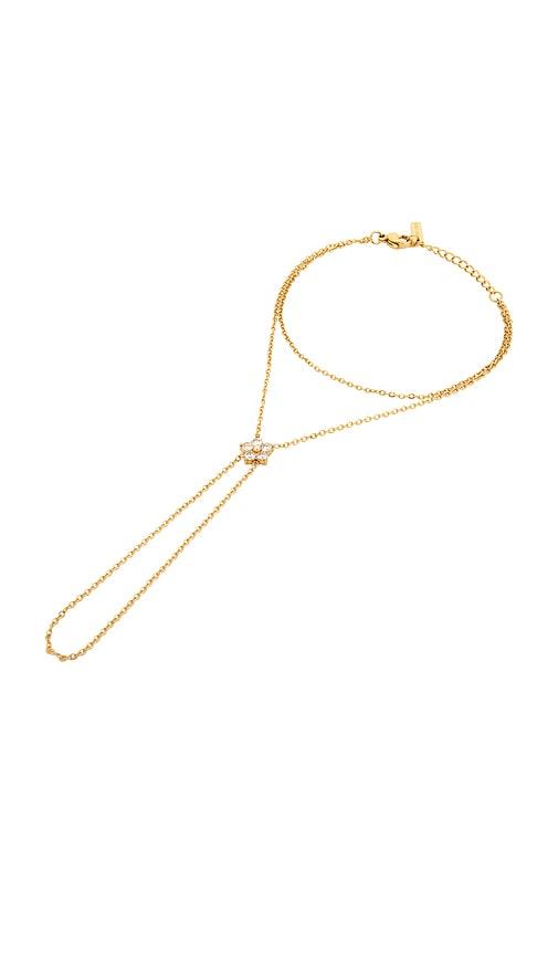 casa clara belle anna hand chain in metallic gold.