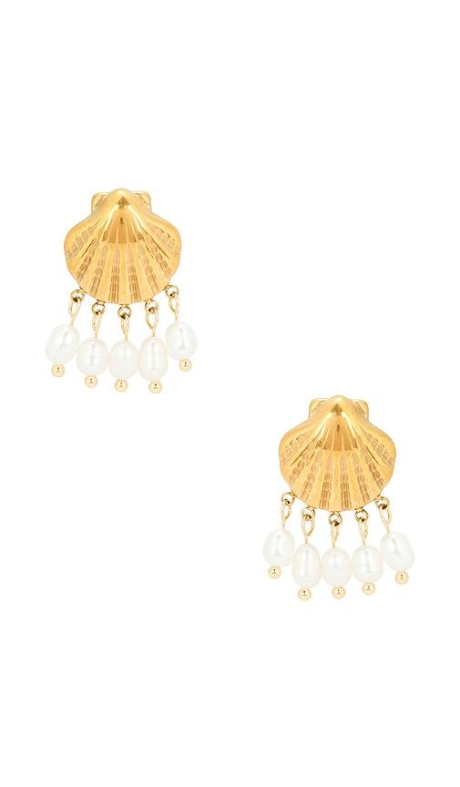 casa clara lake dangle earrings in metallic gold.