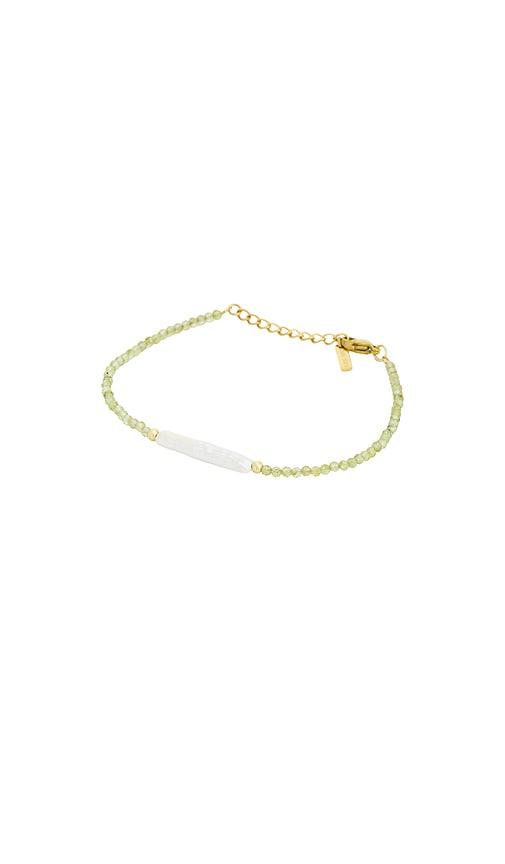 casa clara lumea bracelet in metallic gold.