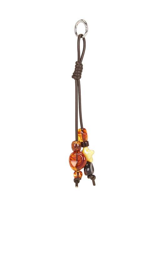 casa clara nash keychain in brown.