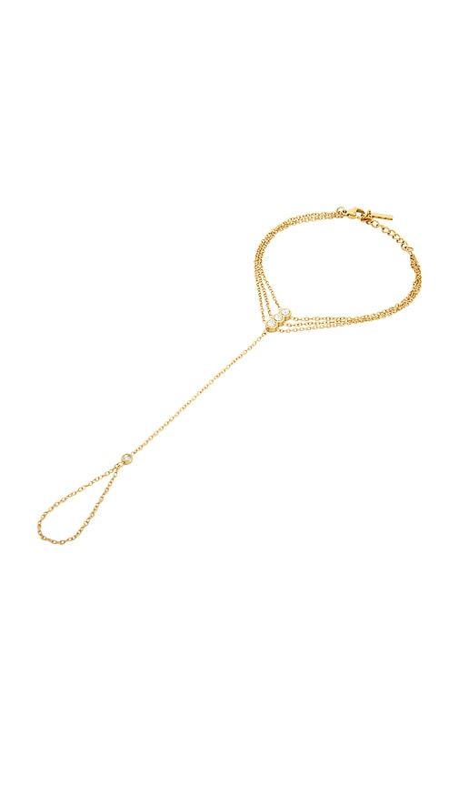 casa clara reese hand chain in metallic gold.