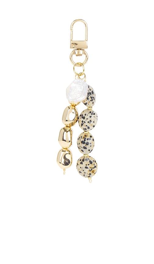 casa clara rhodes keychain in white.