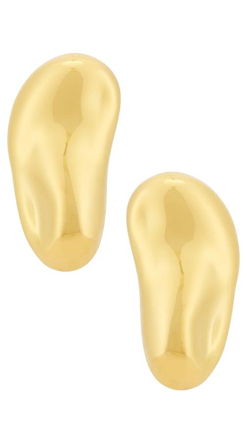 casa clara rise earring in metallic gold.