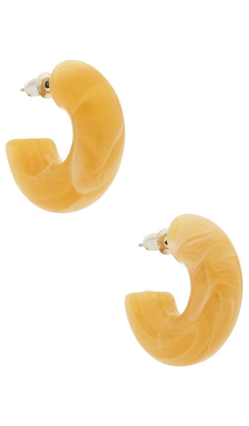 casa clara salma earrings in orange.