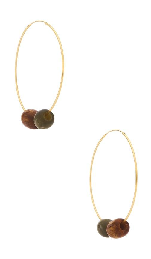 casa clara treasure hoop earing in brown.