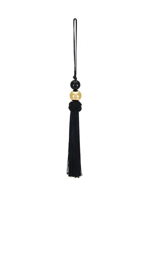 cendre lucetta bag charm in black.