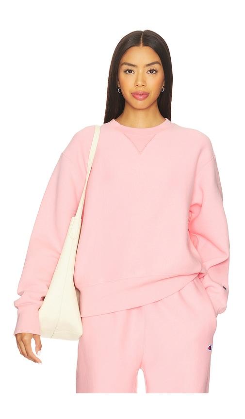 champion essentials reverse weave crew neck sweatshirt in pink. - size m (also in s, xs)
