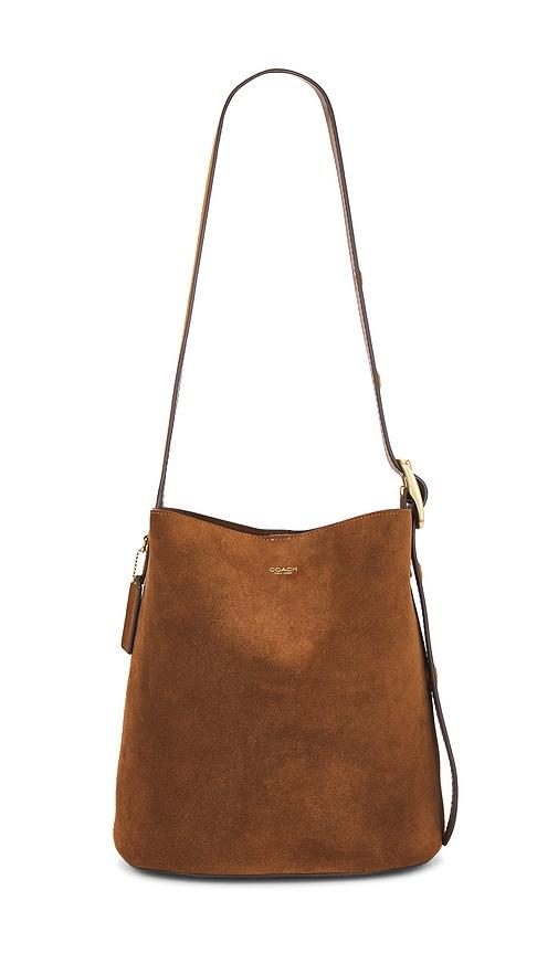 coach bleeker bucket bag in brown.