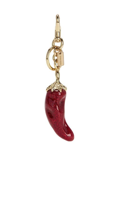 coach chili pepper bag charm in red.