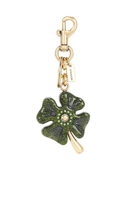 coach metal four leaf clover bag charm in green.