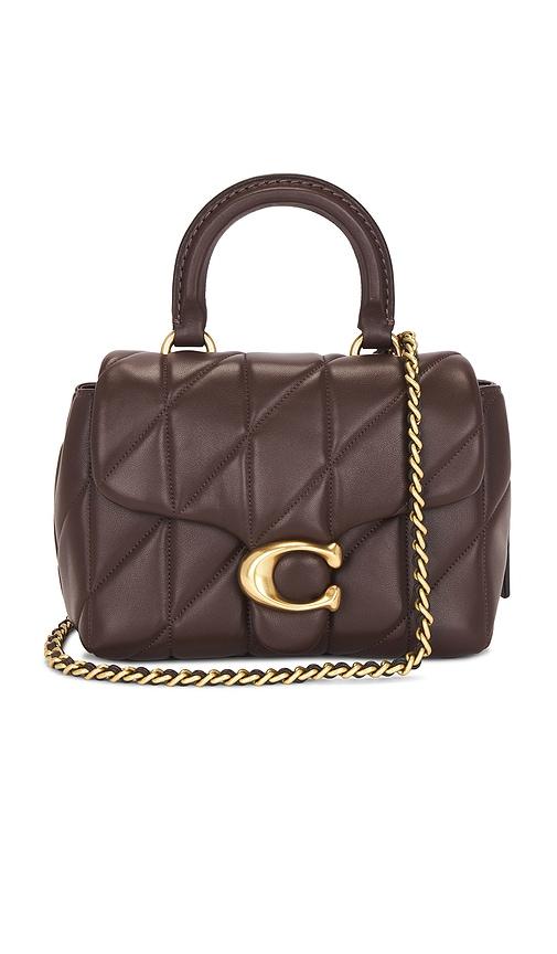 coach quilted tabby top handle bag in brown.