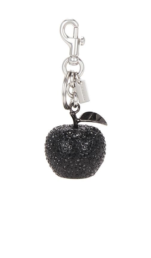 coach small crystal apple bag charm in black.