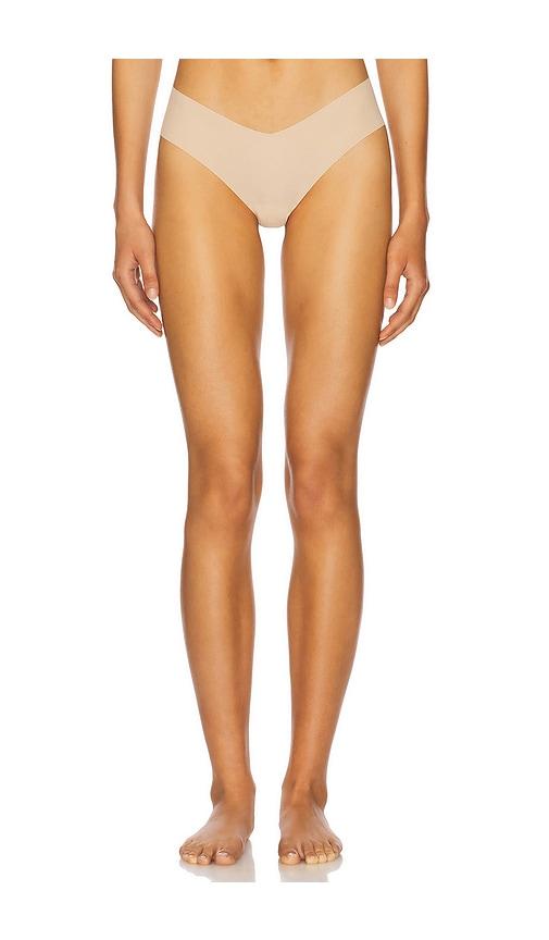 commando invisible rib thong in nude.