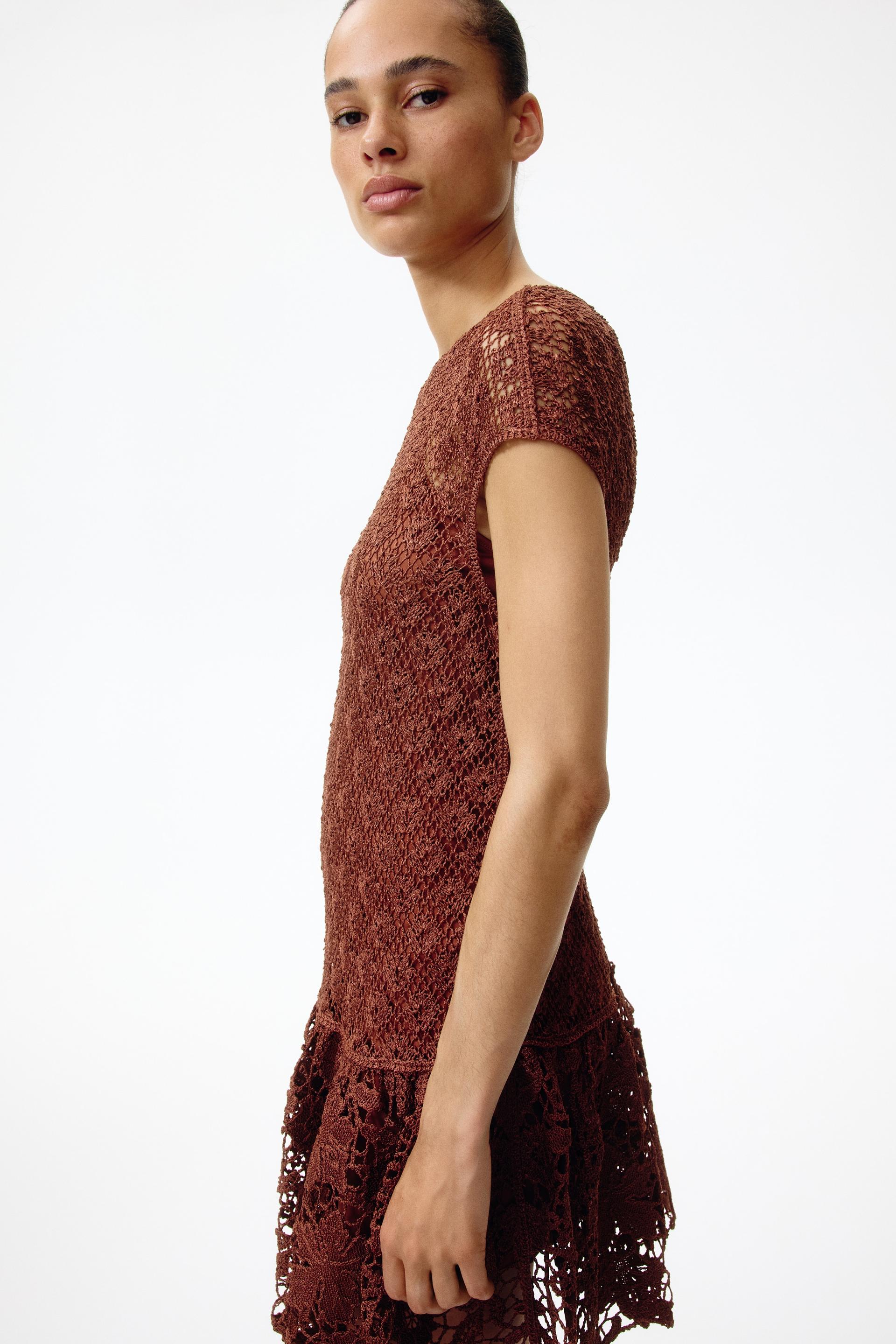 crochet-look dress with flared skirt