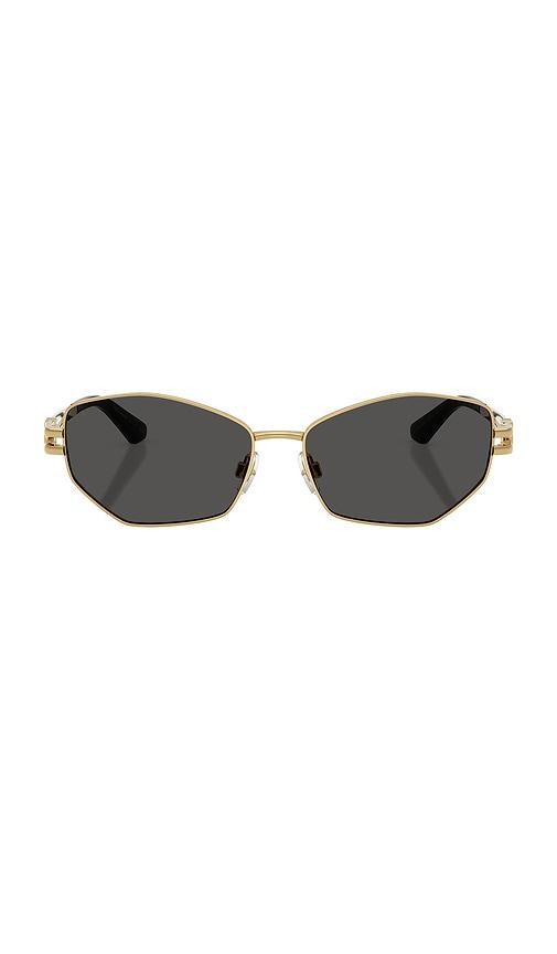 dolce & gabbana geometric sunglasses in metallic gold.