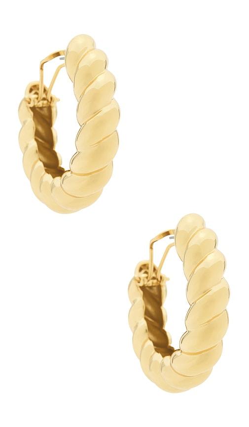 eddie borgo torsade hoop earrings in metallic gold.