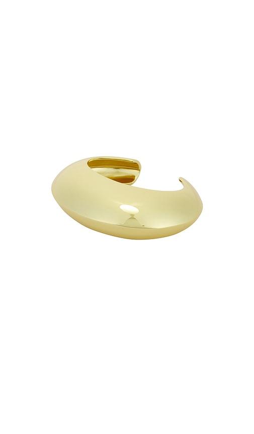 eliou alegra cuff bracelet in metallic gold.