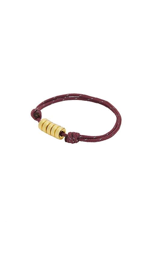 eliou cade bracelet in burgundy,metallic gold.