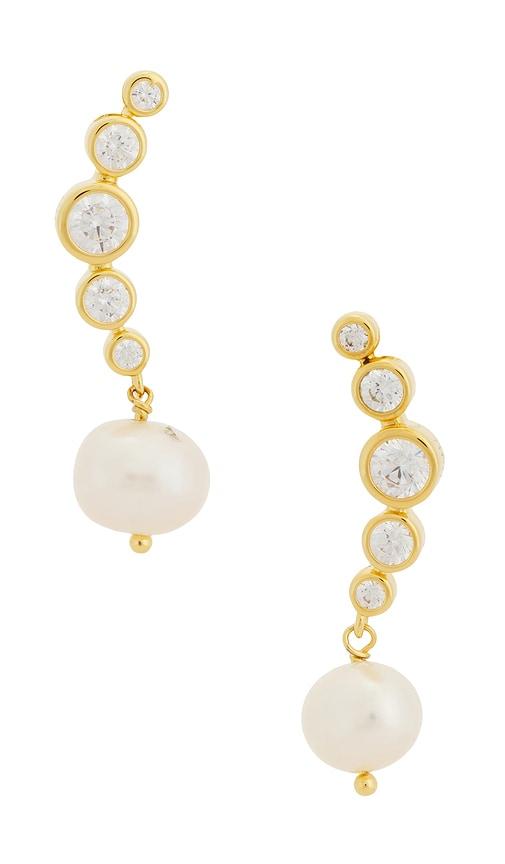 eliou elene earrings in metallic gold.